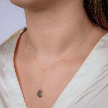 Y-Collier met labradoriet en diamant 14 karaat geelgoud